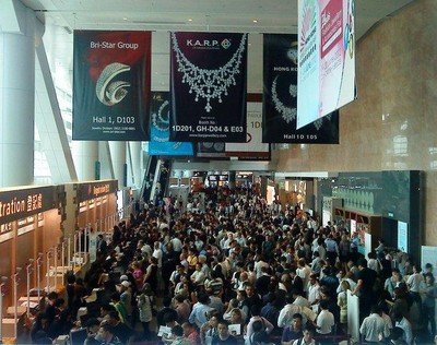 Day 1 at registration counters of June Hong Kong Jewellery & Gem Fair 2011: buyers queue up for admission badges