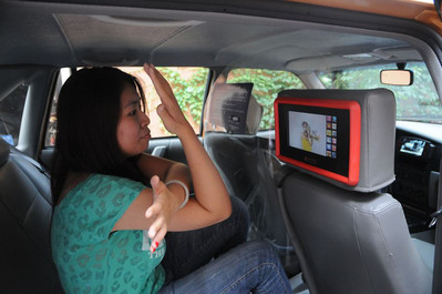 The Passenger follows the in-Taxi workout instructor of Mr.and Miss WOW Campaign promoted on Touchmedia's interactive Touchscreen to do exercise for health